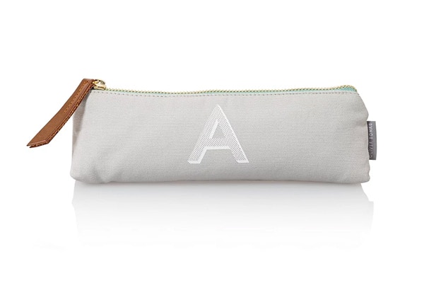 Alphabet Pencil Case Oooo, budge over kids, we want to get our mitts on this alphabet pencil case. Chic enough for grown-up stationery fiends like ourselves and useful for classroom students too.