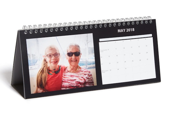 Photobox A present that gives all year round - Personalise his office space with this easy-to-build photo desk calendar printed on top quality paper.