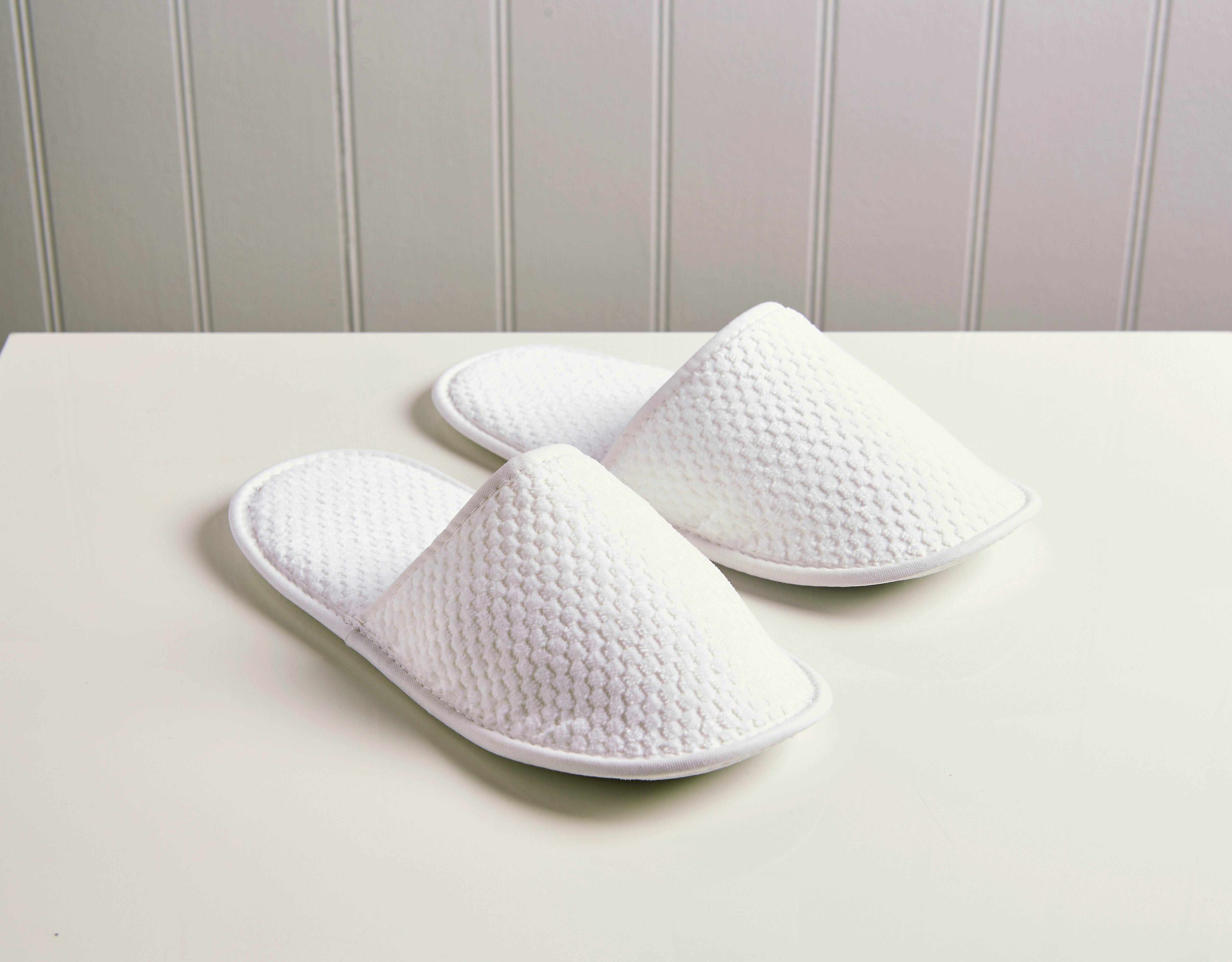Brixton Slippers Make home feel like a hotel with a pair of cotton towelling slippers.