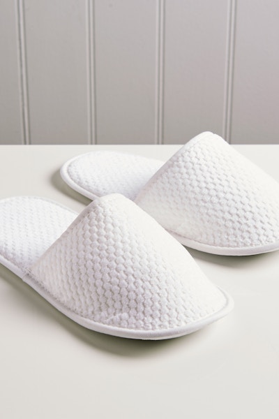 Brixton Slippers Make home feel like a hotel with a pair of cotton towelling slippers.