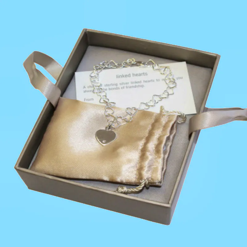 Wicked Uncle Give your bridesmaid or flower girl a gift to treasure.  This sterling silver heart link bracelet is smartly presented in a pouch and gift box – a timeless classic.