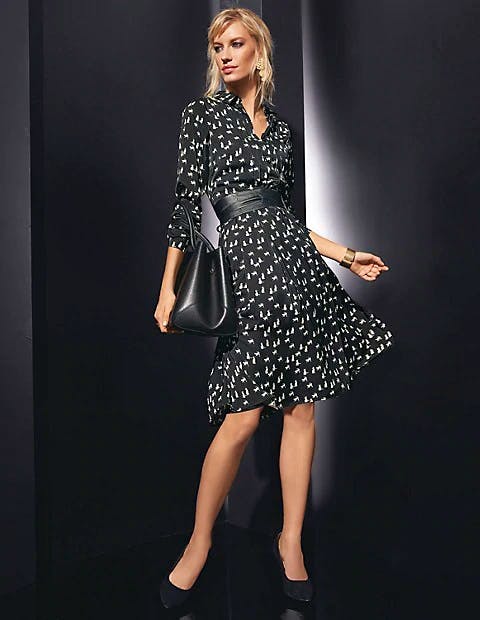 Cat Print Dress A playful, monochrome cat motif brings vitality to this smart, long-sleeved frock.