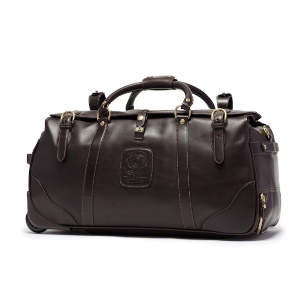 Ghurka, Kilburn RS No. 252 Leather Rolling Suitcase - $1995 A favourite of Meghan’s and steeped in history; beautiful pieces handcrafted  in the US using the finest of materials and are worth every cent (or penny, if you hop along to Fortnum & Mason).