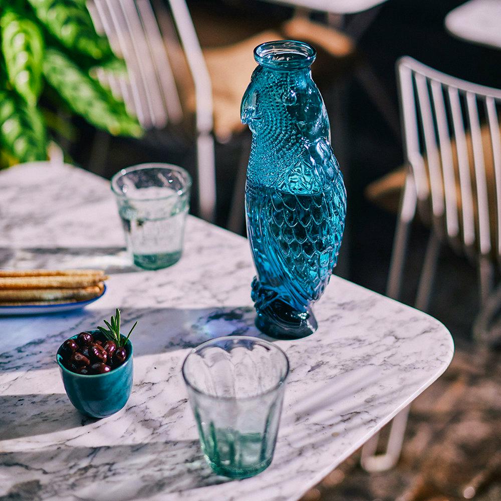 Amara Let this fantastic blue glass cockatoo carafe do the talking. £33