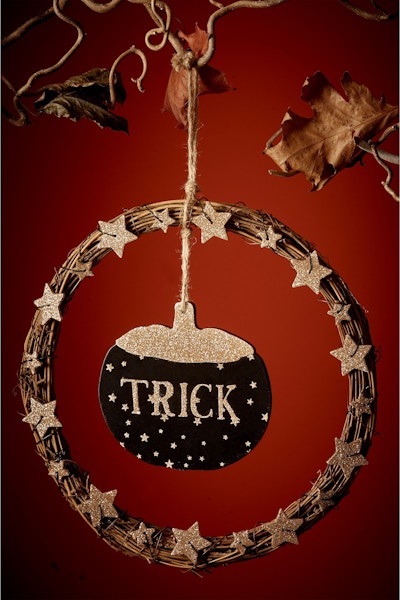 £10, Next Let them know you’re game with this reversible trick or treat reversible wreath. We dare you.
