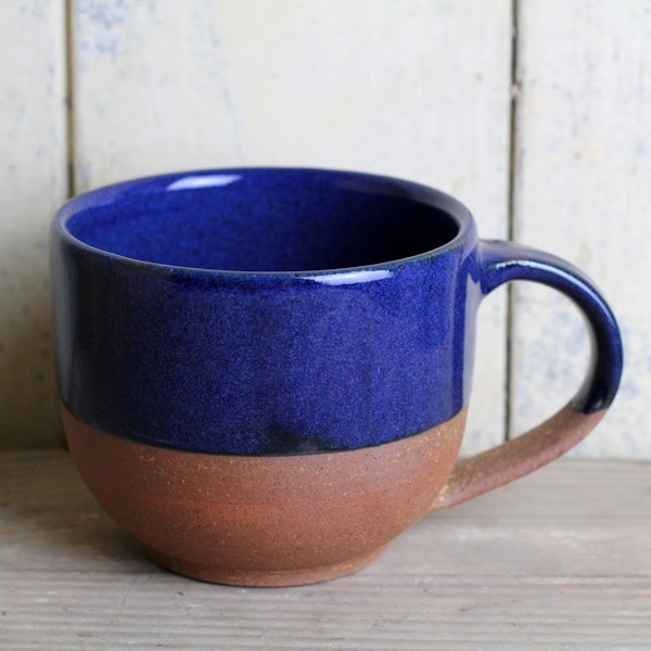 Navy And Terracotta Coffee Cup, £10.95, Closet & Botts It is imperative that winter afternoons spent curled up with a book must be accompanied with multiple cups of cocoa. We have our eye on this beautifully chunky mug for all our hot choc needs this season.