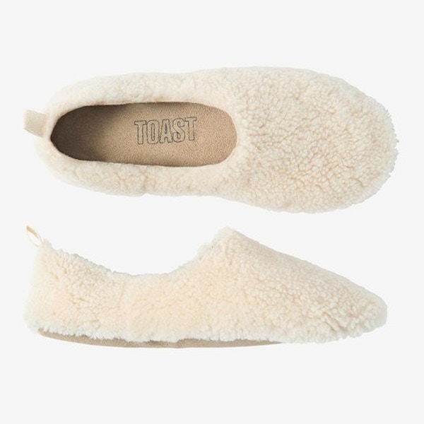 Shearling Sheepskin Slippers, £79, Toast Keeping toes toasty is the first commandment of cosiness. How better to do so than with this gorgeous sheepskin pair of slippers?