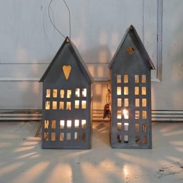 Small Metal House, £16, Flint These mini houses looks utterly charming illuminated by tealight. Dot them about the house or cluster together on a mantelpiece or dresser.