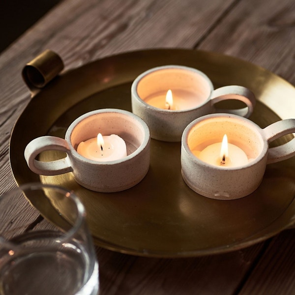 Handmade Stoneware Tealight Holder, £12, Rowen and Wren Rowen and Wren has almost too much to choose from when it comes to stylish but cosy accoutrements for the home. But since candlelight is everything in winter, we find this Florence Nightingale-reminiscent candleholders irresistible.