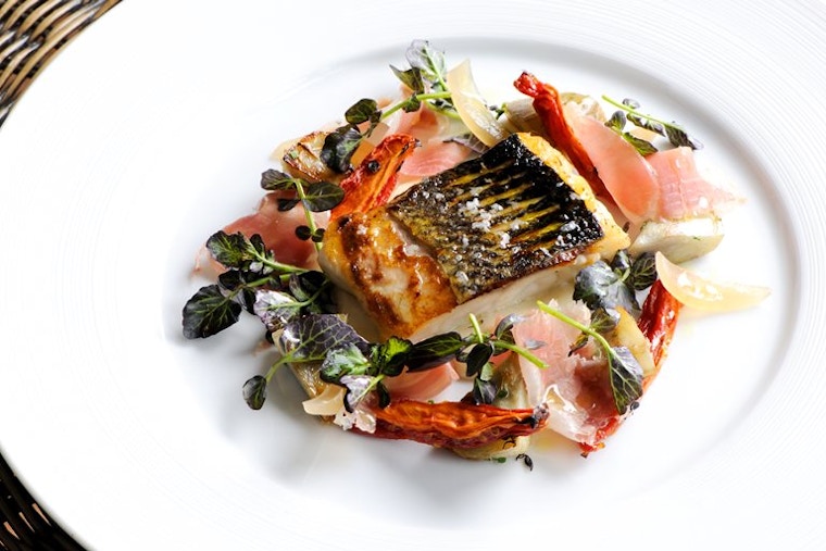 Fillet Of Sea Bass With Parma Ham, Saute Artichokes And Watercress