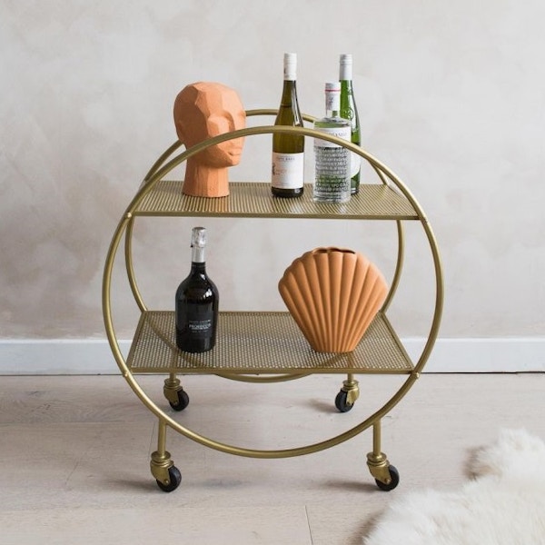 Rose & Grey, Round Brass Mesh Drinks Trolley The Deco styling of this perfect round offering from Rose & Grey is very, very easy on the eye. £235.