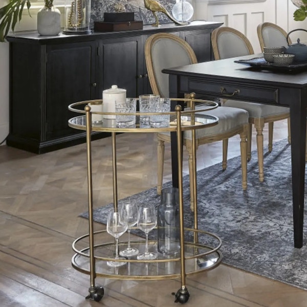 Maisons Du Monde, Hippolyte Aged-Effect Brass Trolley Maisons Du Monde has struck gold (well, brass) with this lovely round drinks trolley. £142.