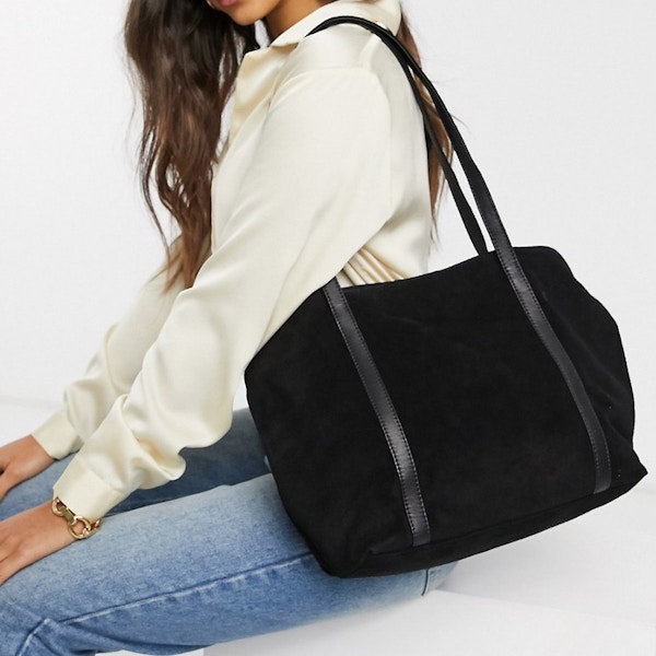 ASOS, Suede Shopper In Black, £32 This suede shopper is perfect for throwing your life’s possessions into, safe in the knowledge that it hasn’t broken the bank.