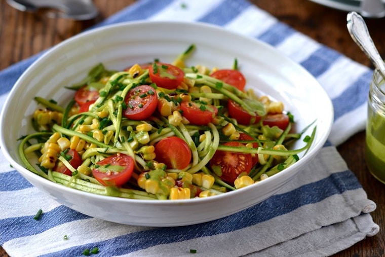 Courgetti with Piccolo tomatoes, grilled corn and herb dressing