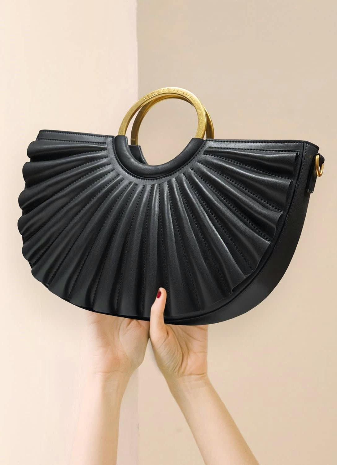 Wolf And Badger Water Moon Satchel, £354