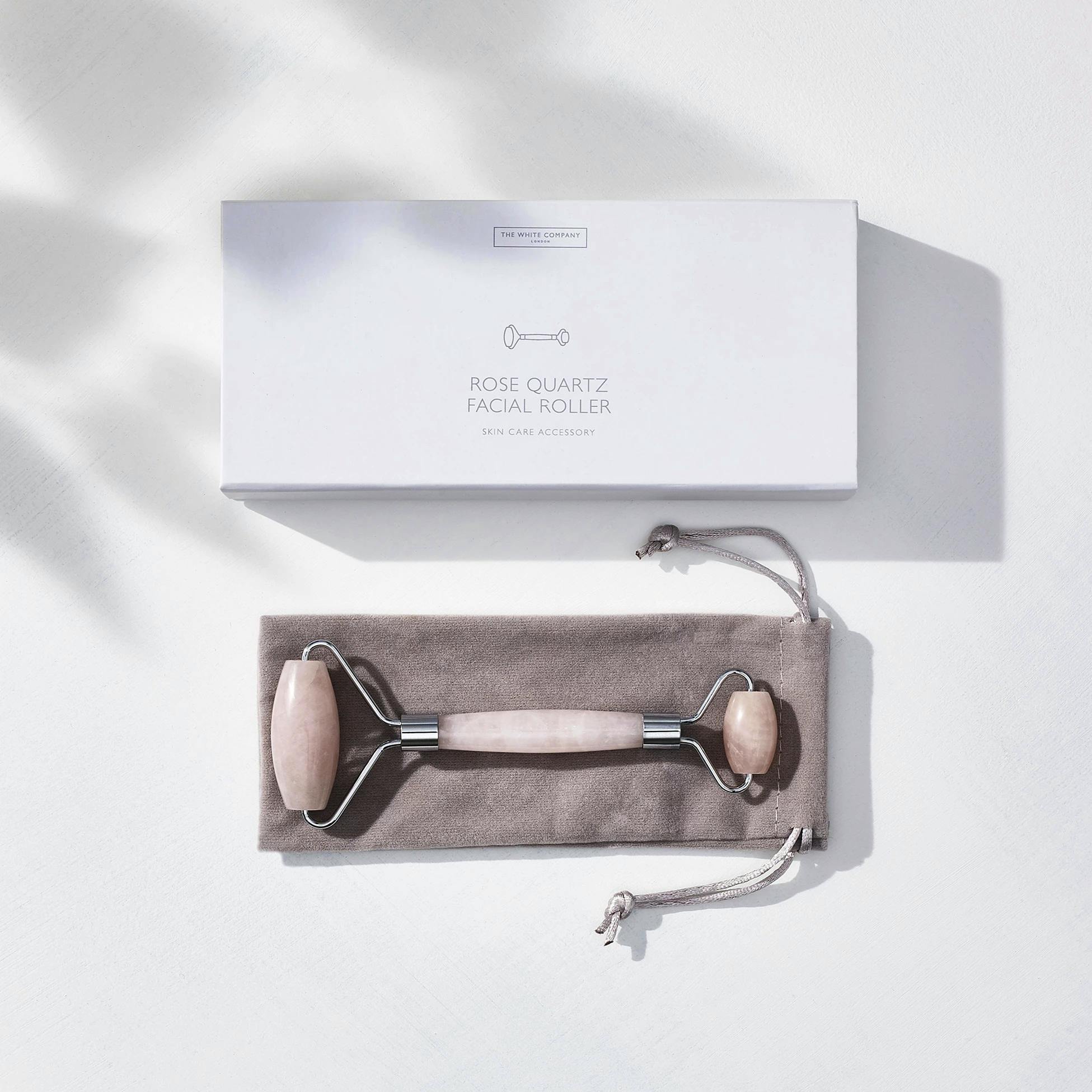 The White Company Rose Quartz Facial Roller, £30