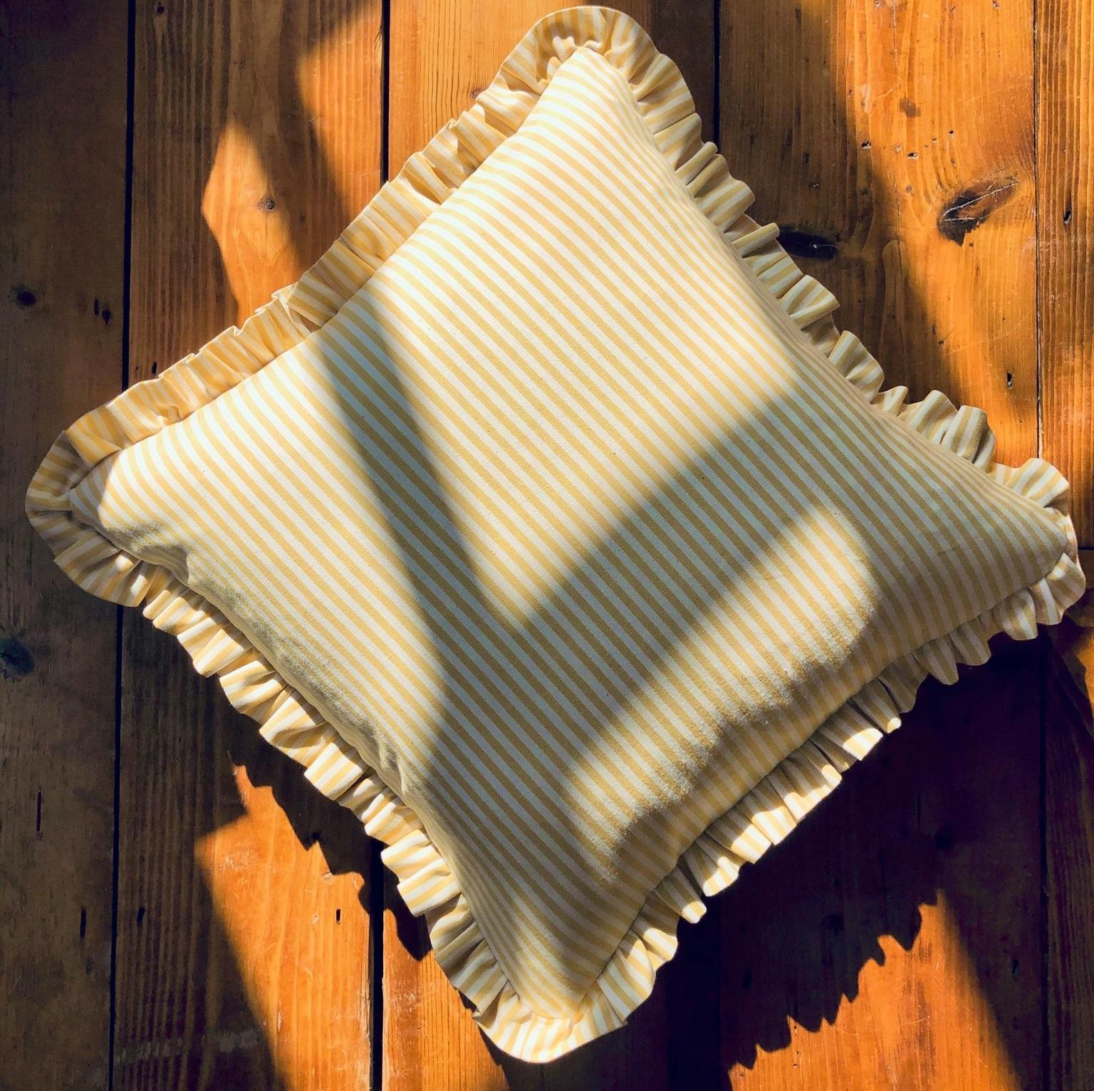 Katy Takla Yellow Stripe Ruffle Edged Cushions, £55