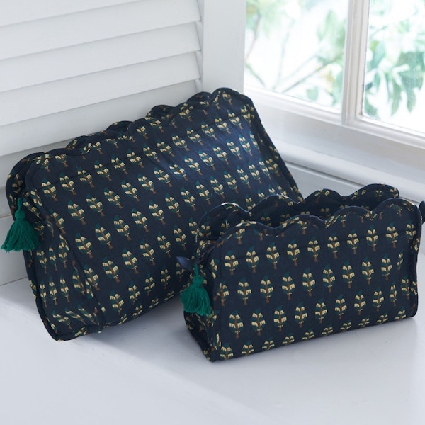 Cologne & Cotton, Blockprinted Washbag, £20 With their smart colour palette, these washbags – printed in Jaipur – carry the promise of fun weekends away.
