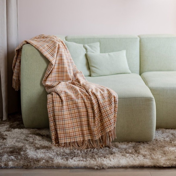 Tartan Blanket Co, Lambswool Blanket In Neutral Gingham, £125 This soft blanket – designed in Edinburgh and woven in Mongolia – is the perfect corrective to cold winter evenings.
