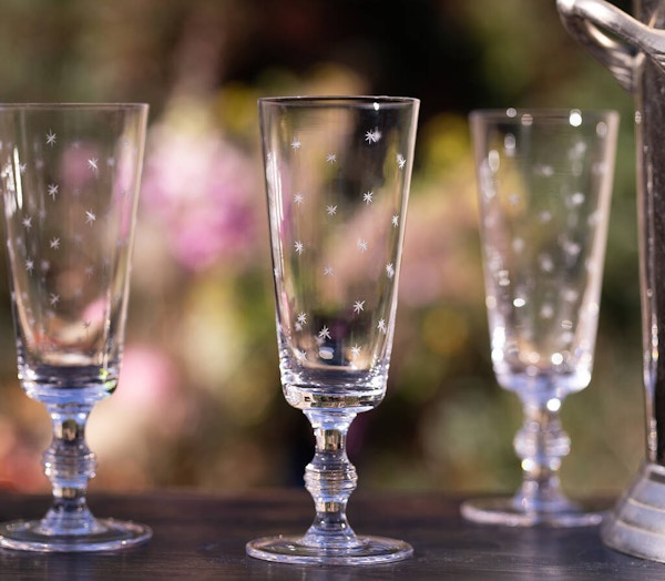 Not on The High Street Set Of Four Champagne Flutes With Stars Design, £55