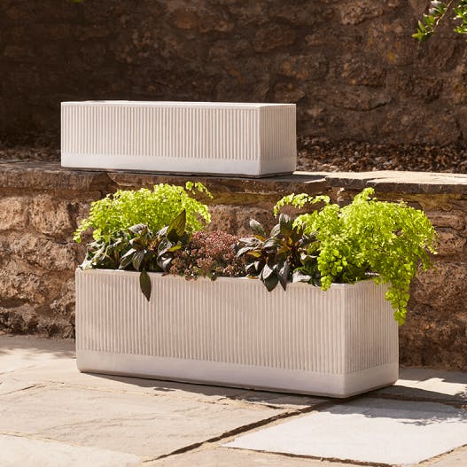 Two Striped Concrete Troughs £125