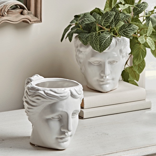 Two Standing Head Planters £45