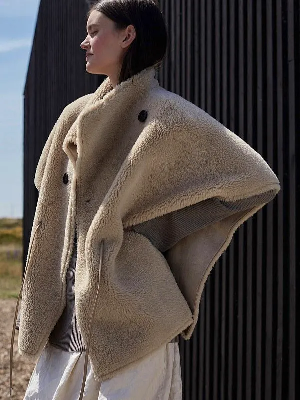 Plumo Sheepskin Cape, £98