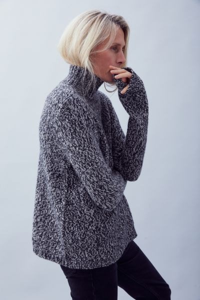 Roll Neck Sweater In Speckled Black £189