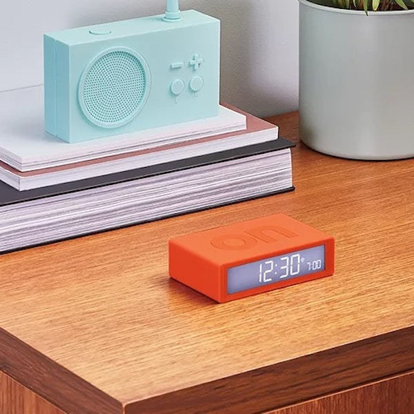 Lexon Flip+ Radio Controlled LCD Digital Alarm Clock, Orange. £40