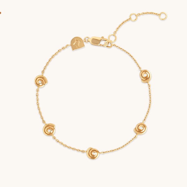 Astrid & Miyu Shell Crystal Charm Bracelet In Gold, £70