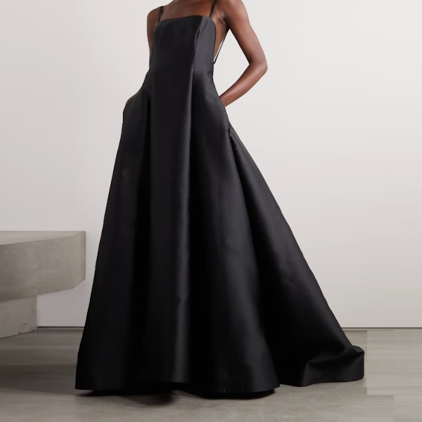 Valentino Garavani, Open-Back Pleated Duchesse-Satin Gown, £14,000 Crafted from duchesse-satin, this beautiful gown is all elegance, its fitted bodice flowing out to a perfect full skirt that was made for the grandest of grand entrances.