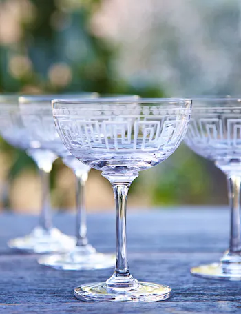 Six Champagne Saucers with Greek Key Design