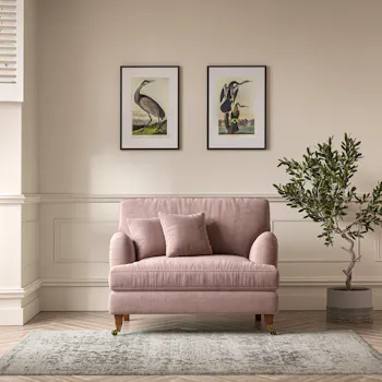 Emeline Velvet Snuggle Chair with Antique Castor Legs