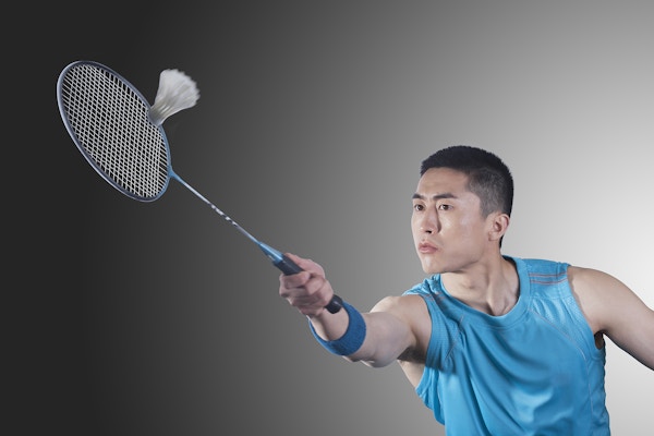 Young-man-playing-badminton