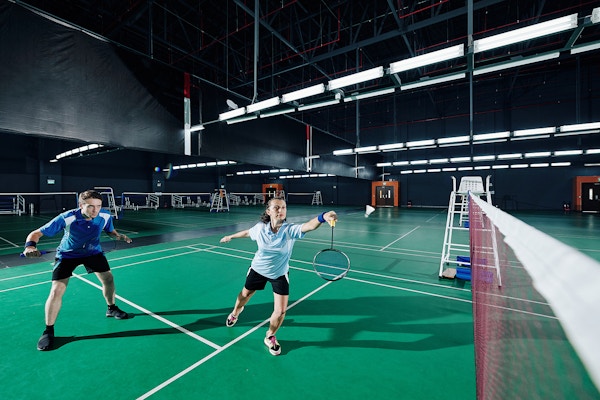 Bigstock-Mixed-Double-Playing-Badminton-360842986