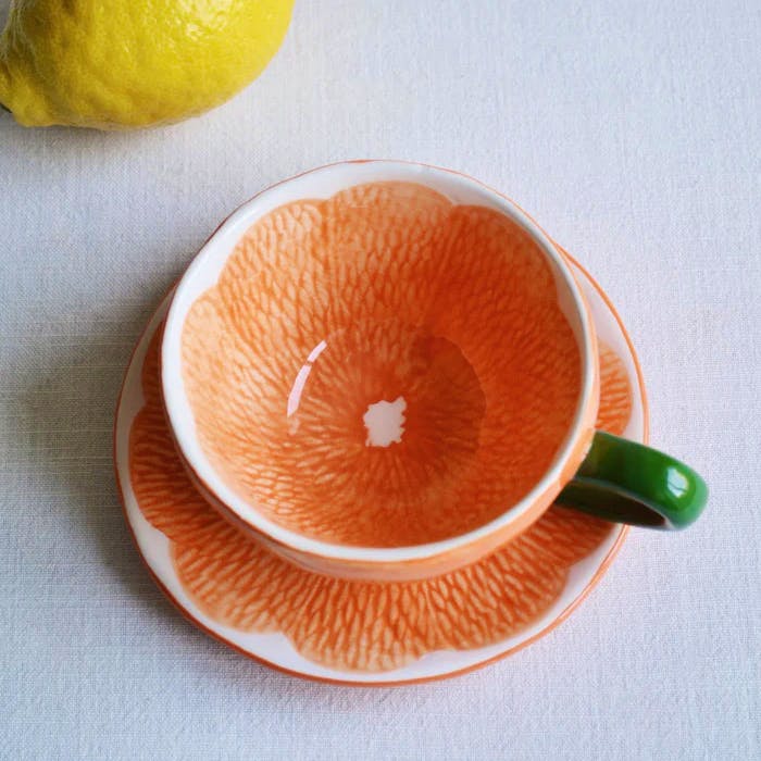 Spicer & Wood Orange teacup and saucer, now £22.50