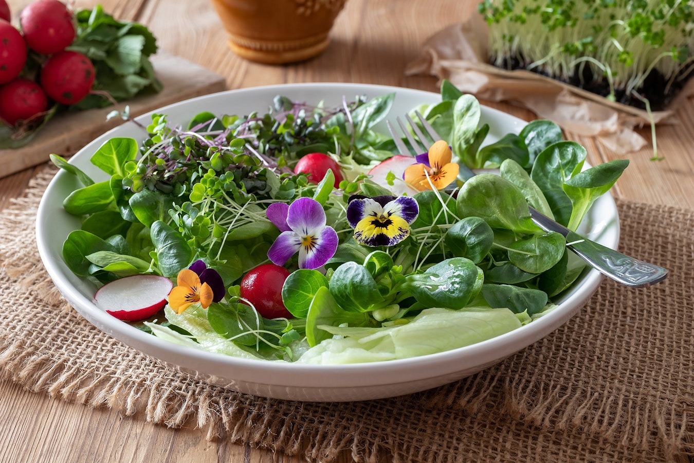 Bigstock-Salad-With-Edible-Pansies-And--287480701