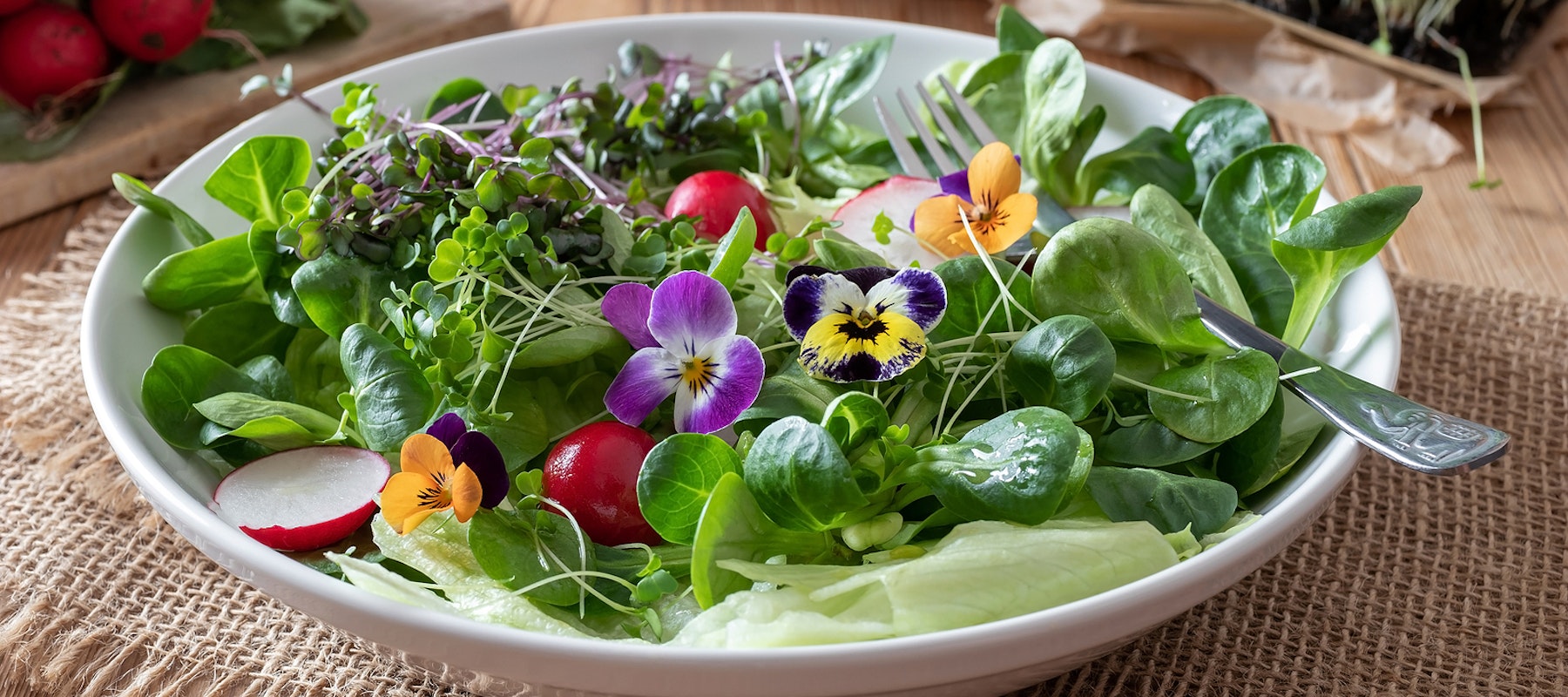 Bigstock-Salad-With-Edible-Pansies-And--287480701