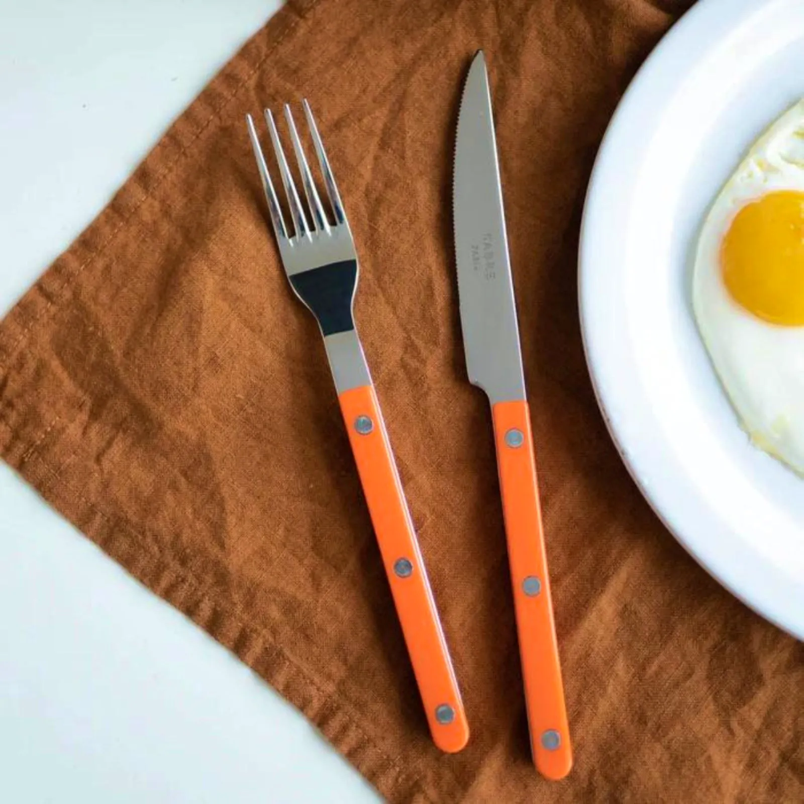 Sabre Paris Bistrot Solid in Orange Colourful Parisian charm at £312 for 32 piece set.