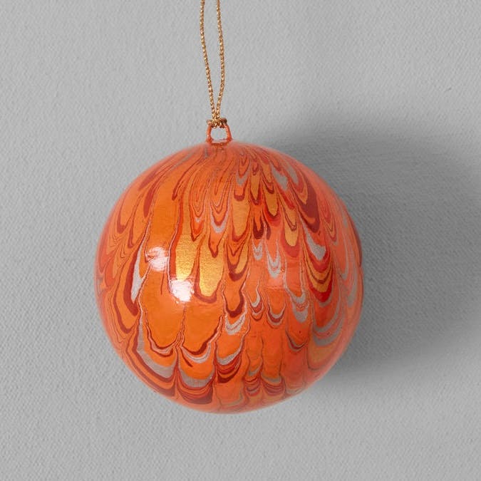 Hand Marbled Bauble In Coral £12