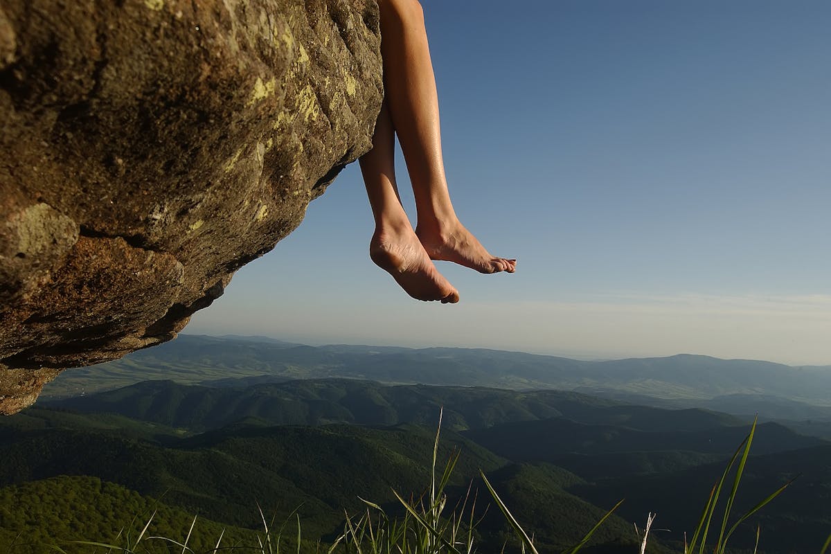 Bigstock-Female-Feet-On-High-Landscape-96912521