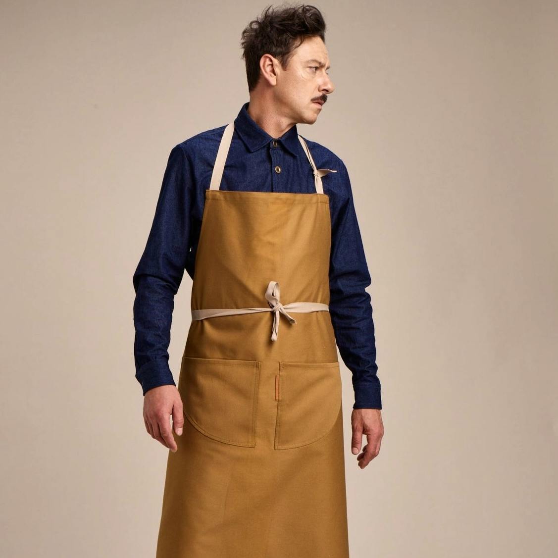 Carrier Company Long Apron, £55