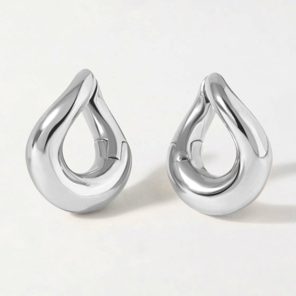 Edge Of Ember Twist Hoop Earrings, £85