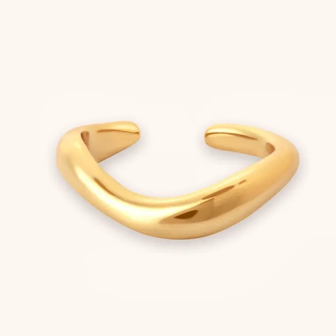 Astrid And Miyu Gold Wave Ear Cuff, £40