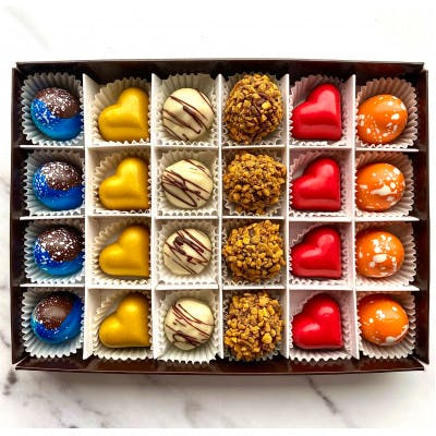 Yumbles Vegan Vanilla Caramel Milk Choc Ganache Filled Half Easter Egg, £15.99