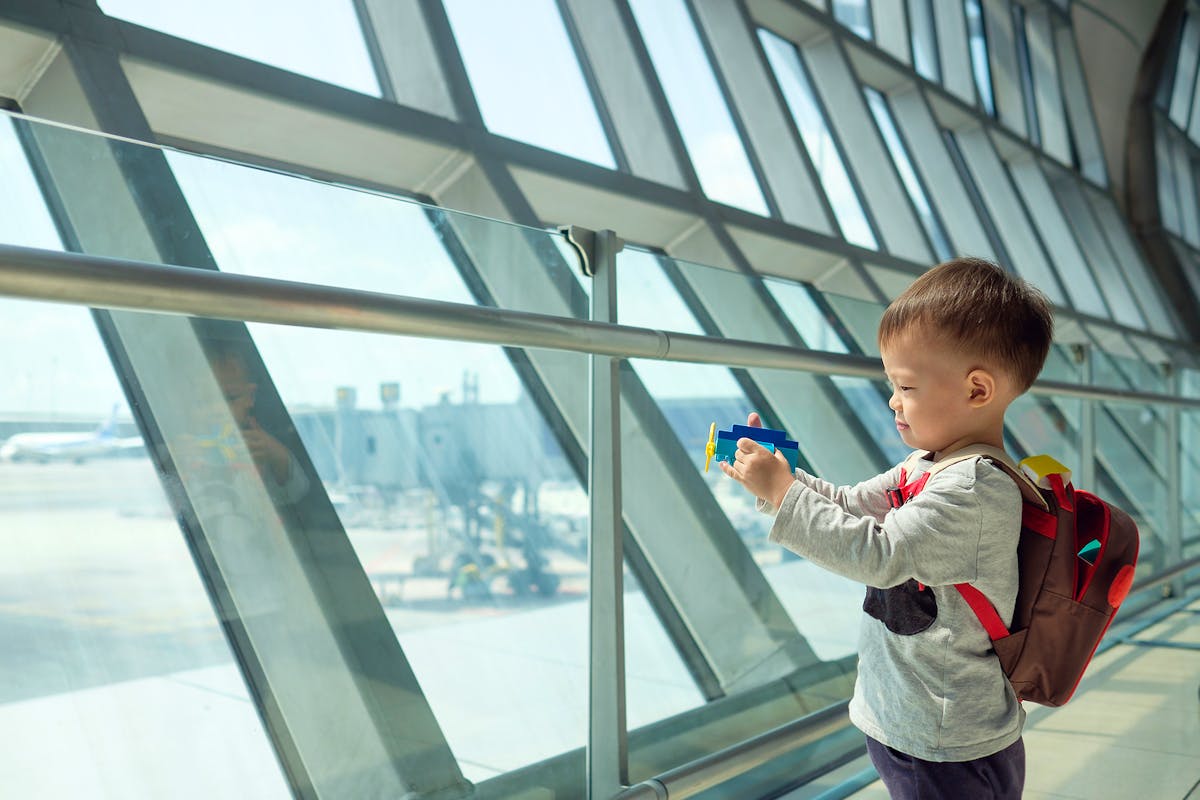 Bigstock-Little-Traveler-Cute-Smiling--257778820
