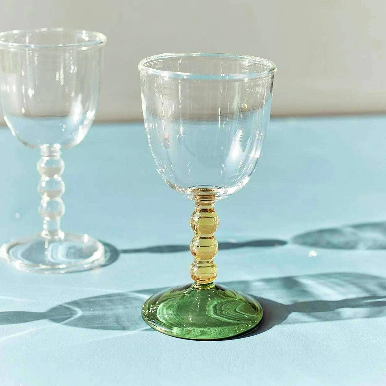 Maison Flaneur Hand Blown Circle Stem Wine Glass in Yellow/Green, £28