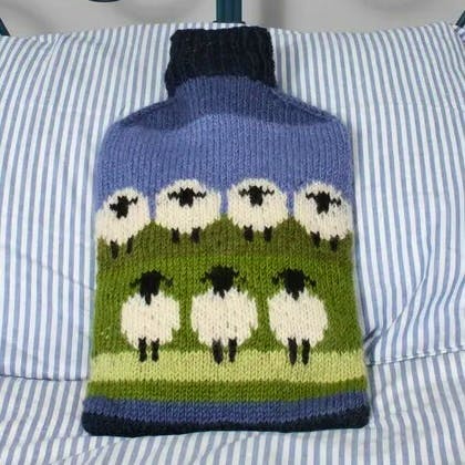 Country & Home Pachamama Flock of Sheep Hot Water Bottle, £29.99