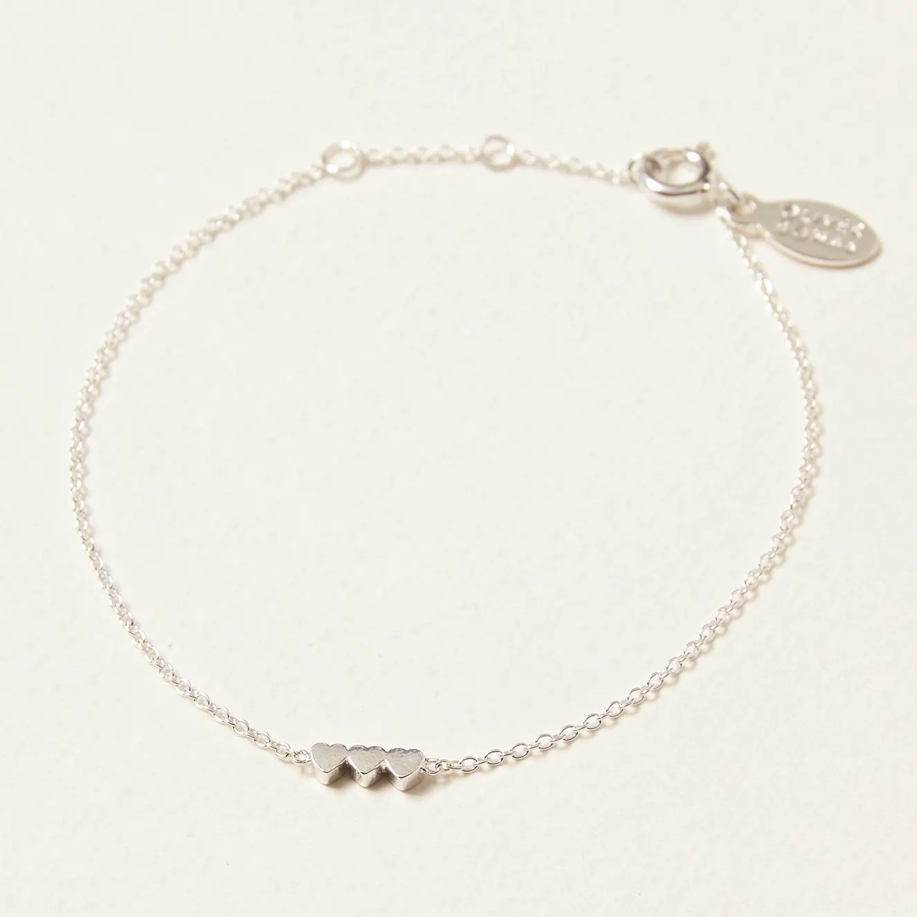 Oliver Bonas Tiny Triple Silver Heart Bracelet, £26