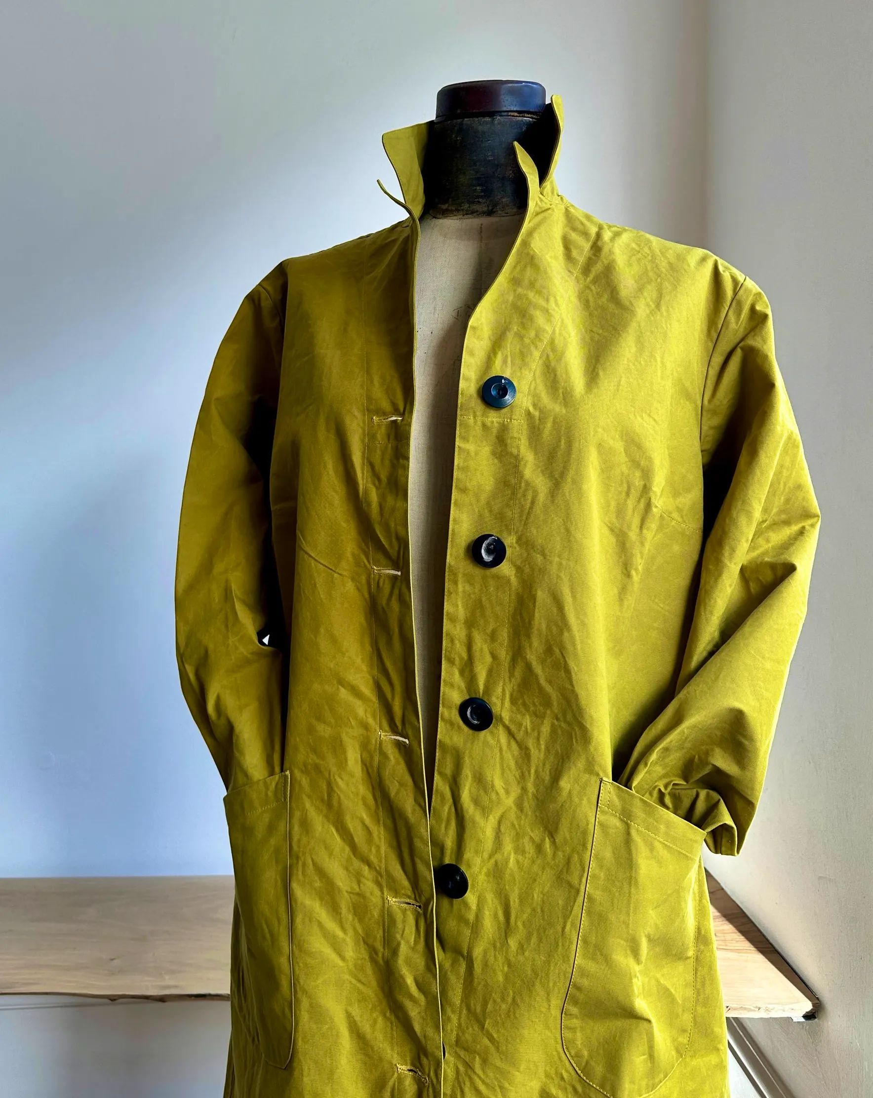 Freight Greengage Dry Waxed Duster Coat, £240